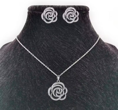 SET 2 PIEZAS PLATEADO FLOR CRISTALES