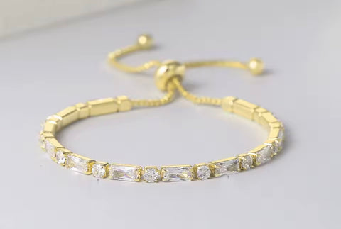 PULSERA AJUSTABLE DORADA CRISTALES RECTANGULARES